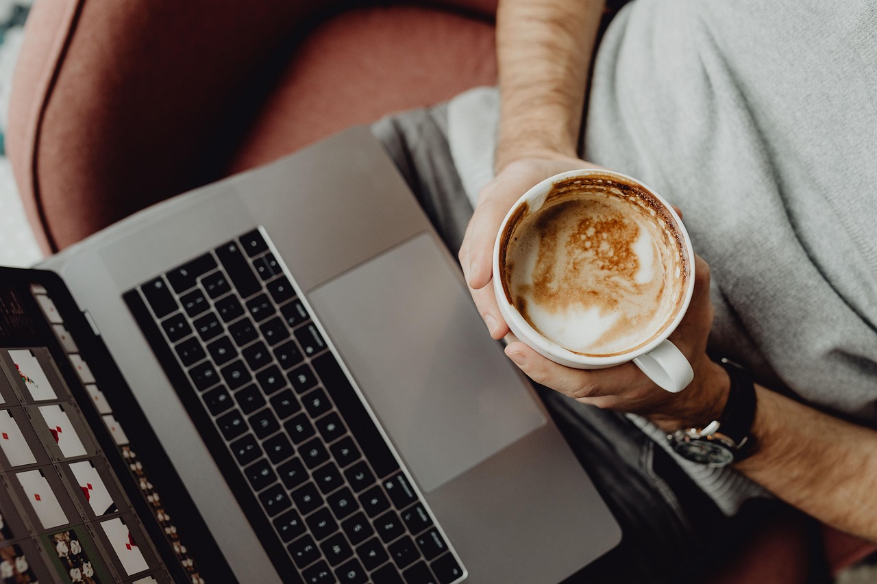 Coffee, cup, computer — Common Challenges in Forex Trading and How to Overcome Them